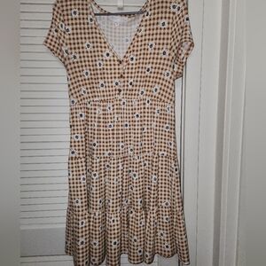 Cute plus size checkered orange and cream colored dress in the size L!